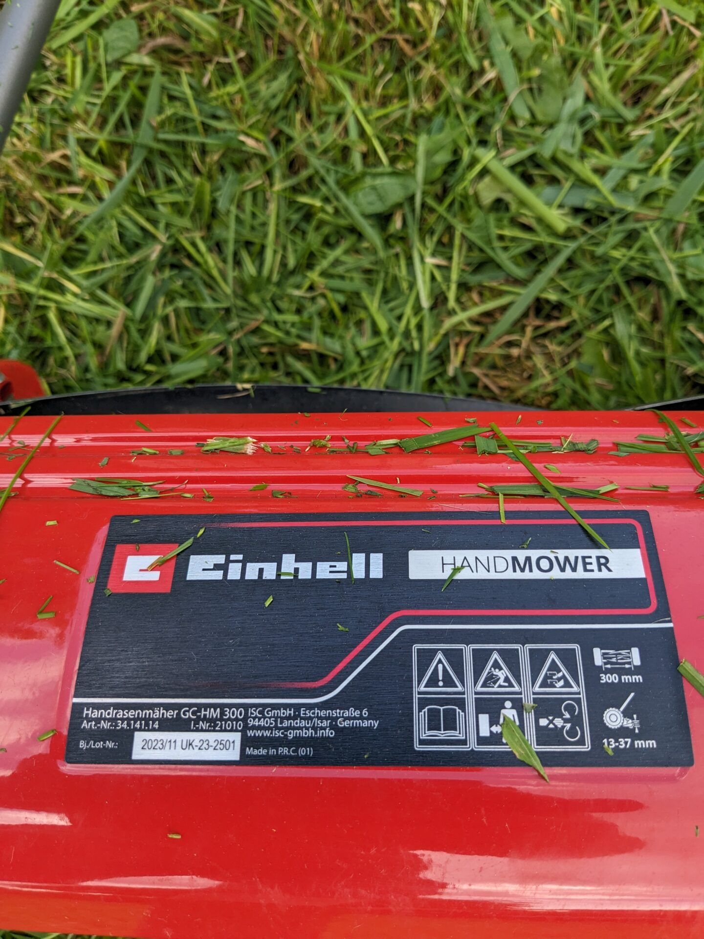 Mowing grass by hand